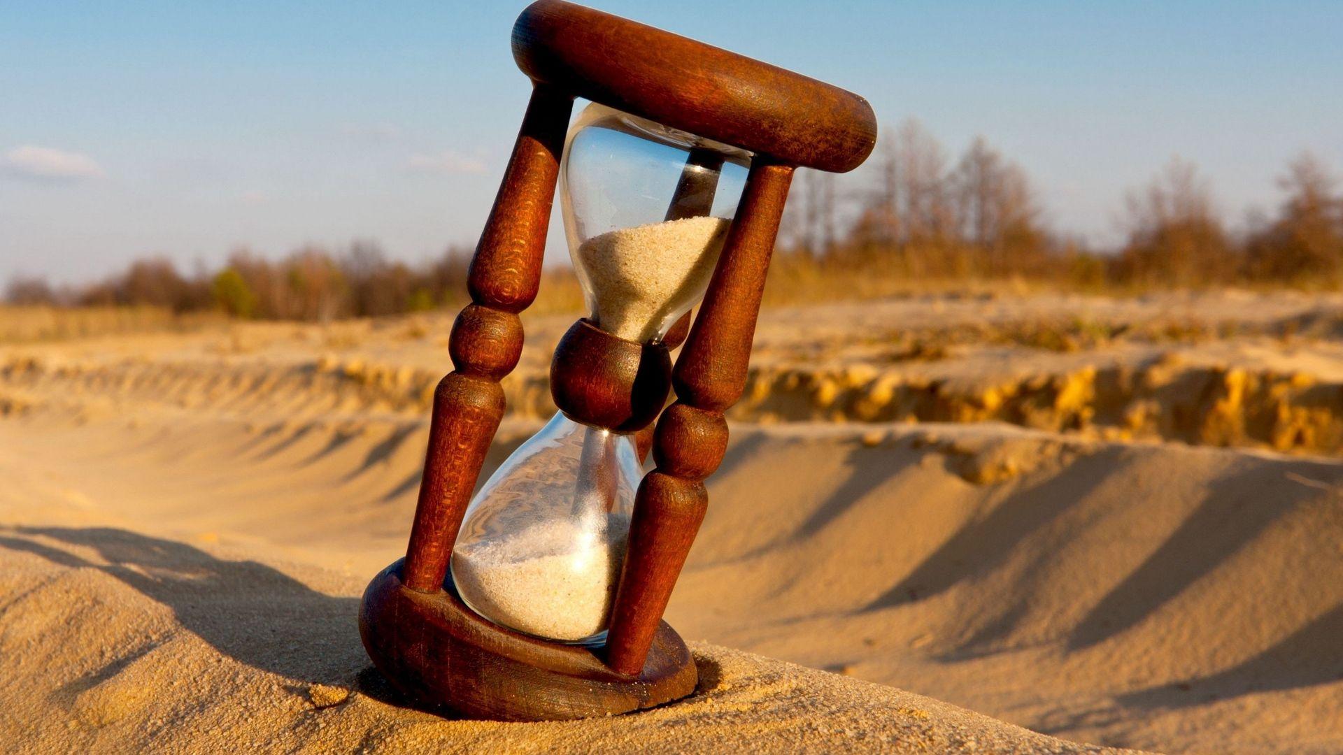 Hình nền đồng hồ trên cát