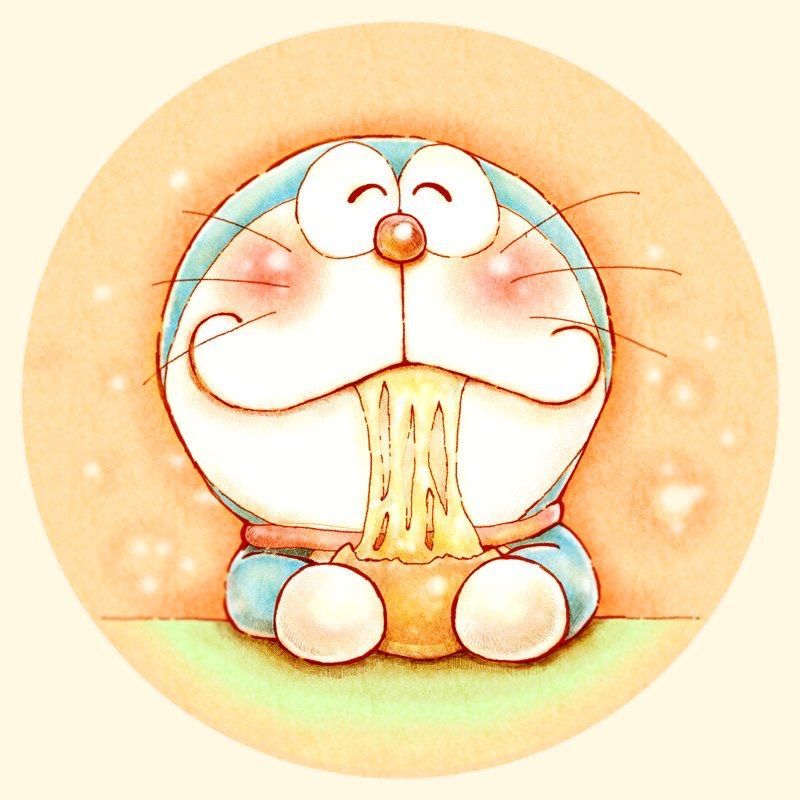 Ảnh Doraemon đang được ăn bánh rán